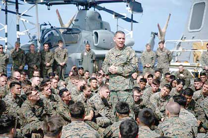 PACIFIC OCEAN (Jan. 12, 2018) Col. Joseph Clearfield, commanding officer of the 15th Marine Expeditionary Unit (MEU), addresses Marines and Sailors of the 15th MEU aboard the amphibious transport dock ship USS San Diego (LPD 22). The 15th MEU and America Amphibious Ready Group are operating in the U.S. 7th Fleet area of operations to enhance regional partnerships and serve as a ready-response capability for any type of contingency. U.S. Marine Corps photo by Cpl. Jeremy Labo