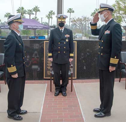 SAN DIEGO (April 9, 2021) Capt. Devin Morrison (right), incoming commanding officer Naval Medical Center San Diego (NMCSD)/Navy Medicine Readiness and Training Command San Diego (NMRTC), relieves Capt. Bradford Smith (left) as commanding officer during a change of command ceremony on board NMCSD/NMRTC April 9, 2021. Photo by MC3 Harley Sarmiento. 