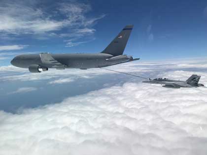 New Hampshire-based KC-46A aircrew refuel a U.S. Navy F/A-18F Super Hornet off the coast of Maryland, July 1, 2020. This marked the first time the aircrew utilized the KC-46A centerline drogue system to refuel an aircraft. (U.S. Navy photo by Lt. Zach Fisher)