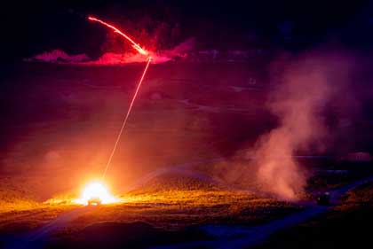 An Abrams tank fires at a target during night live-fire training near Pocheon, South Korea, Aug. 12, 2024. The training was part of Operation Pacific Fortitude, which supports the U.S. alliance with South Korea by deploying forces and transporting equipment to validate unit readiness. Photo by Army Cpl. David Poleski.