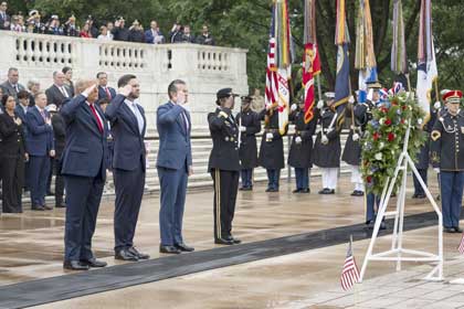 From left, President Donald J. Trump, Vice President JD Vance, Secretary of War Pete Hegseth and Army Maj. Gen. Antoinette Gant, commander of the Military District of Washington, place a wreath during the Memorial Day ceremony at Arlington National Cemetery in Arlington, Va., May 25, 2026.