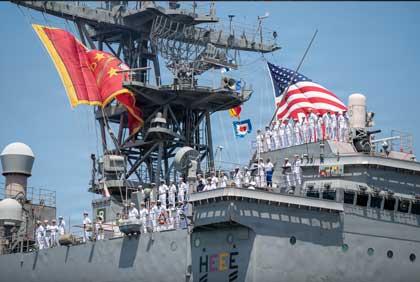 NAVAL BASE SAN DIEGO (June 1, 2026) Sailors assigned to Whidbey Island-class amphibious dock landing ship USS Ashland (LSD 48) man the rails as the ship returns to its homeport of San DIego, June 1, 2026 as families await them on the pier. U.S. Navy photos by MC2 Aja Bleu Campbell. 