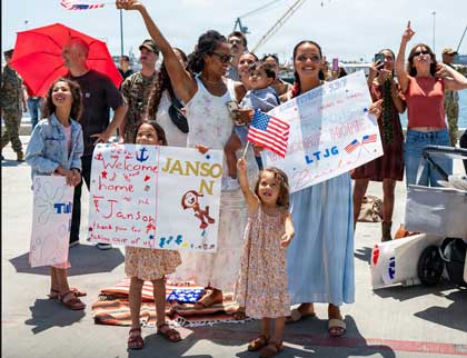 NAVAL BASE SAN DIEGO (June 1, 2026) Sailors assigned to Whidbey Island-class amphibious dock landing ship USS Ashland (LSD 48) man the rails as the ship returns to its homeport of San DIego, June 1, 2026 as families await them on the pier. U.S. Navy photos by MC2 Aja Bleu Campbell. 